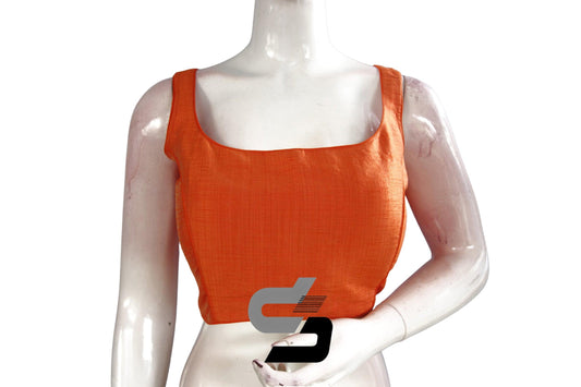 Tangerine Elegance: Elevate your style with this Orange Plain Silk Designer Readymade Blouse. Effortlessly chic, it adds a pop of vibrant color to your ensemble.