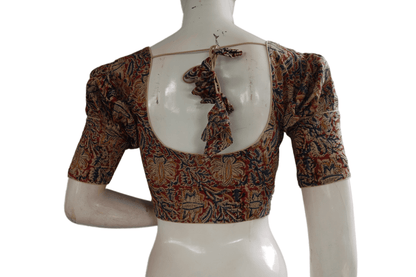 Elevate your ethnic look with our Kalamkari saree blouse, featuring elegant puff sleeves and a designer touch. These ready-made blouses effortlessly blend traditional charm with contemporary style, perfect for any occasion.