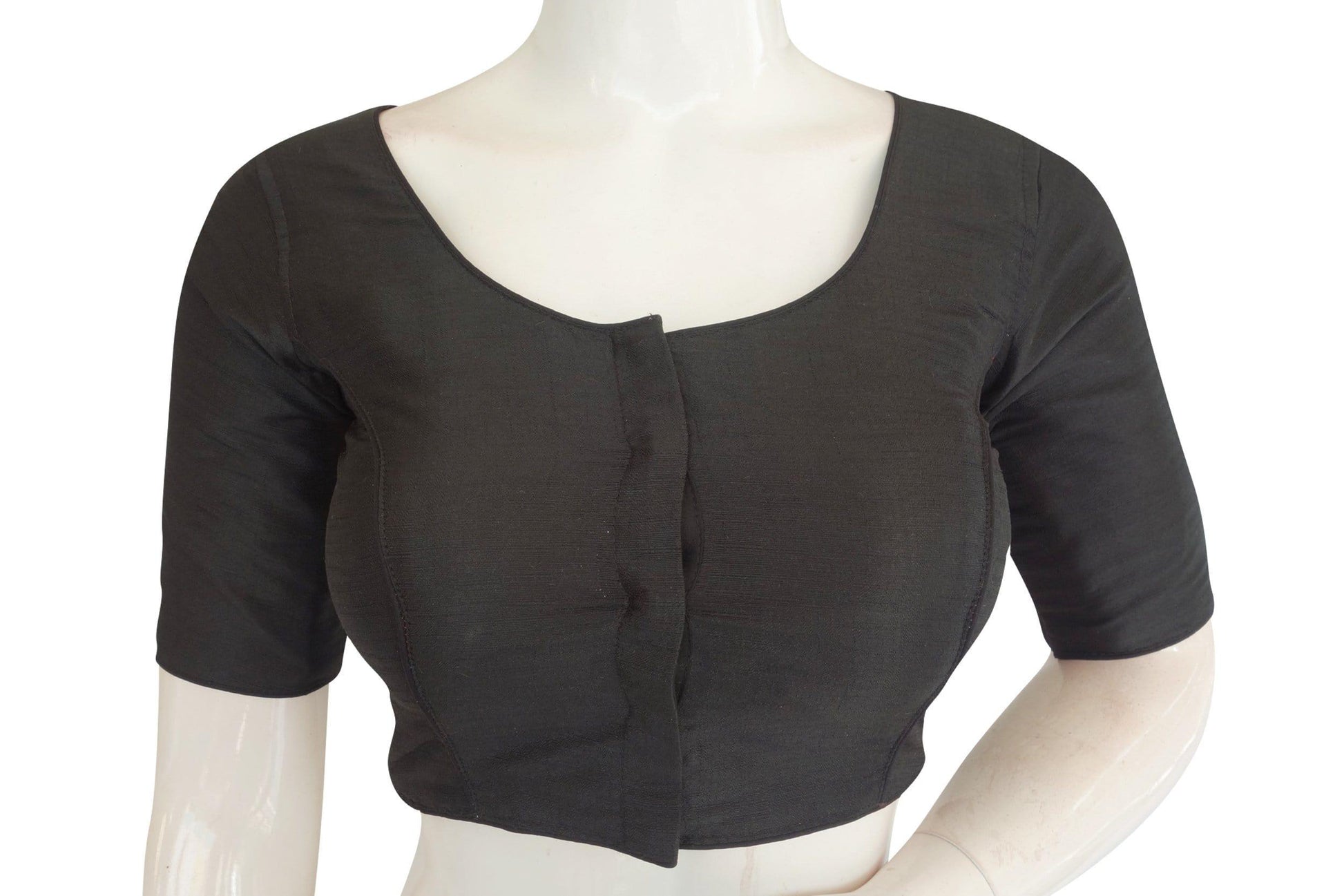 Jet Black Sophistication: Add a touch of timeless elegance to your wardrobe with this plain semi-silk Indian readymade saree blouse. The jet black hue exudes sophistication and versatility, making it perfect for various occasions. Elevate your saree ensemble with this classic piece that offers both style and comfort