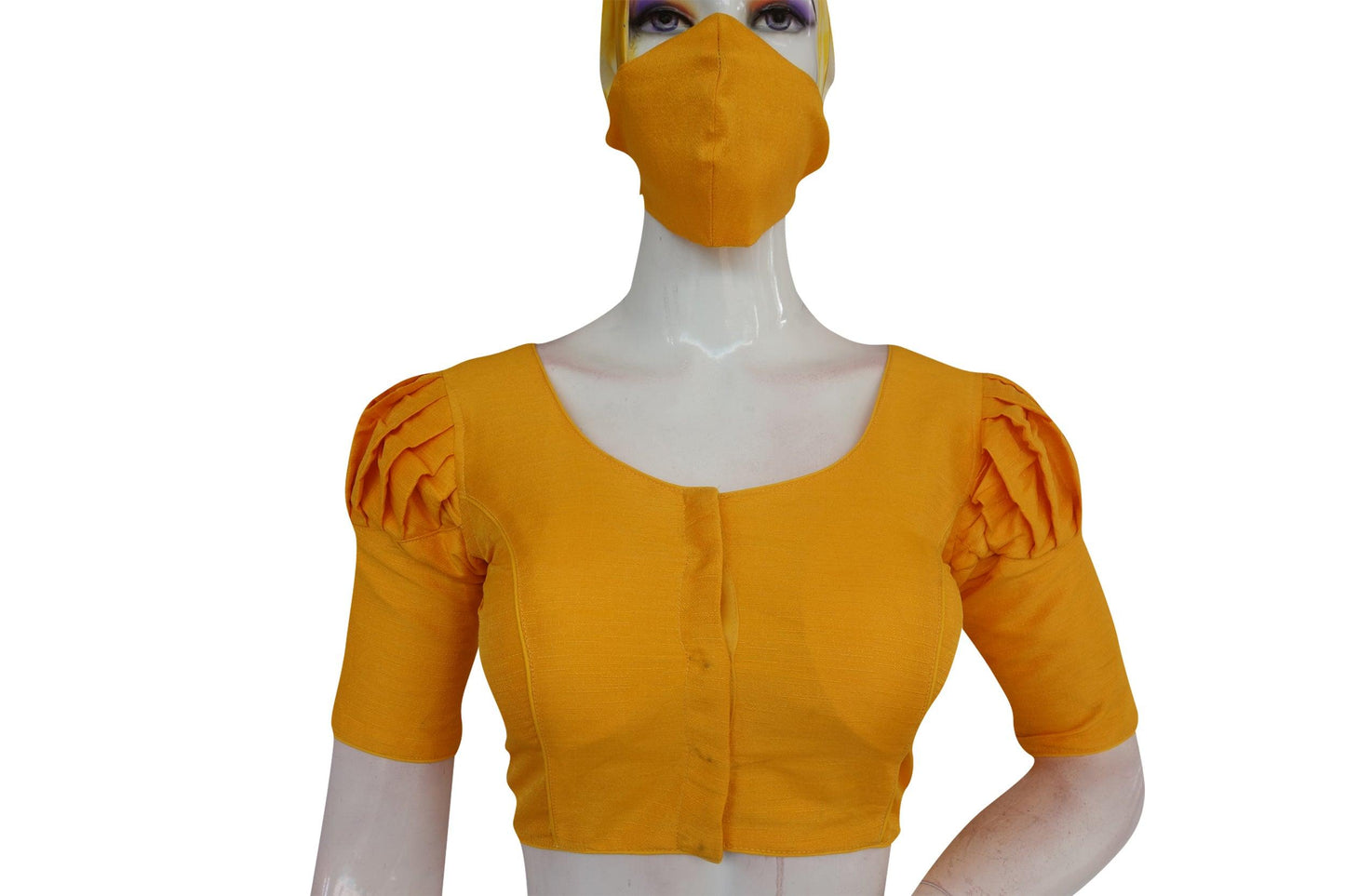 Brighten your look with our radiant sunshine yellow plain puff sleeve readymade blouse, perfectly complemented by a matching face mask. Embrace style and safety in one chic ensemble.
