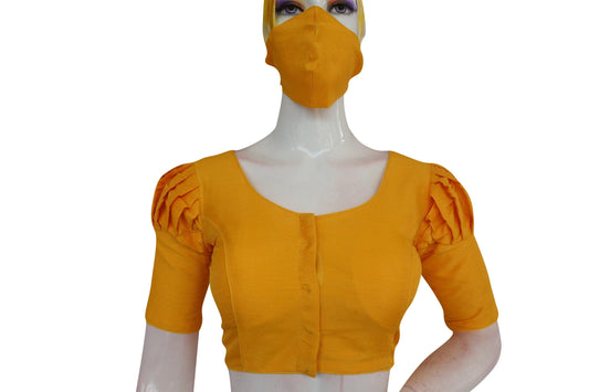 Brighten your look with our radiant sunshine yellow plain puff sleeve readymade blouse, perfectly complemented by a matching face mask. Embrace style and safety in one chic ensemble.