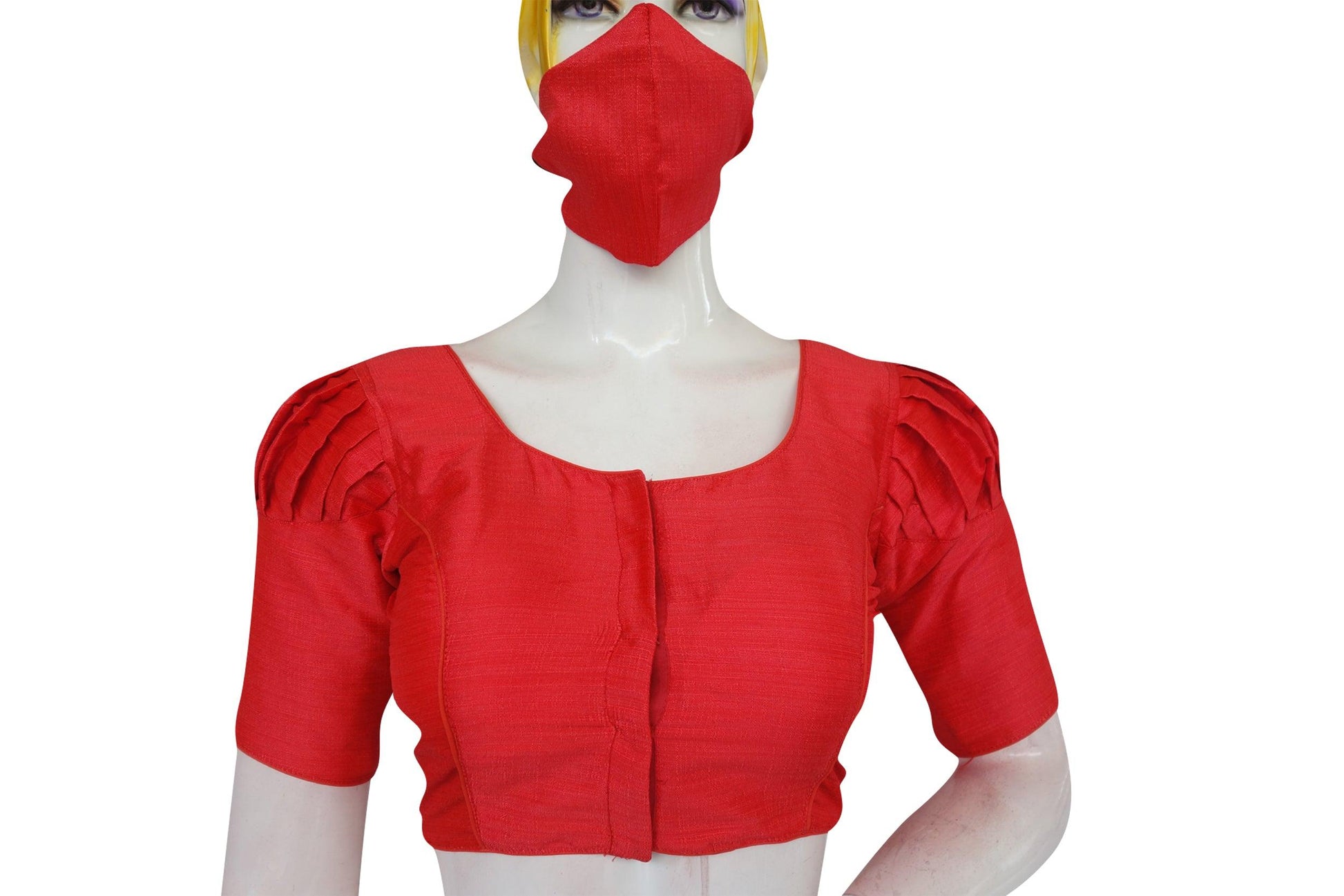 Step into peach perfection with this plain puff sleeve readymade blouse paired with a matching face mask. Effortlessly stylish and coordinated, it adds a touch of elegance to any ensemble.