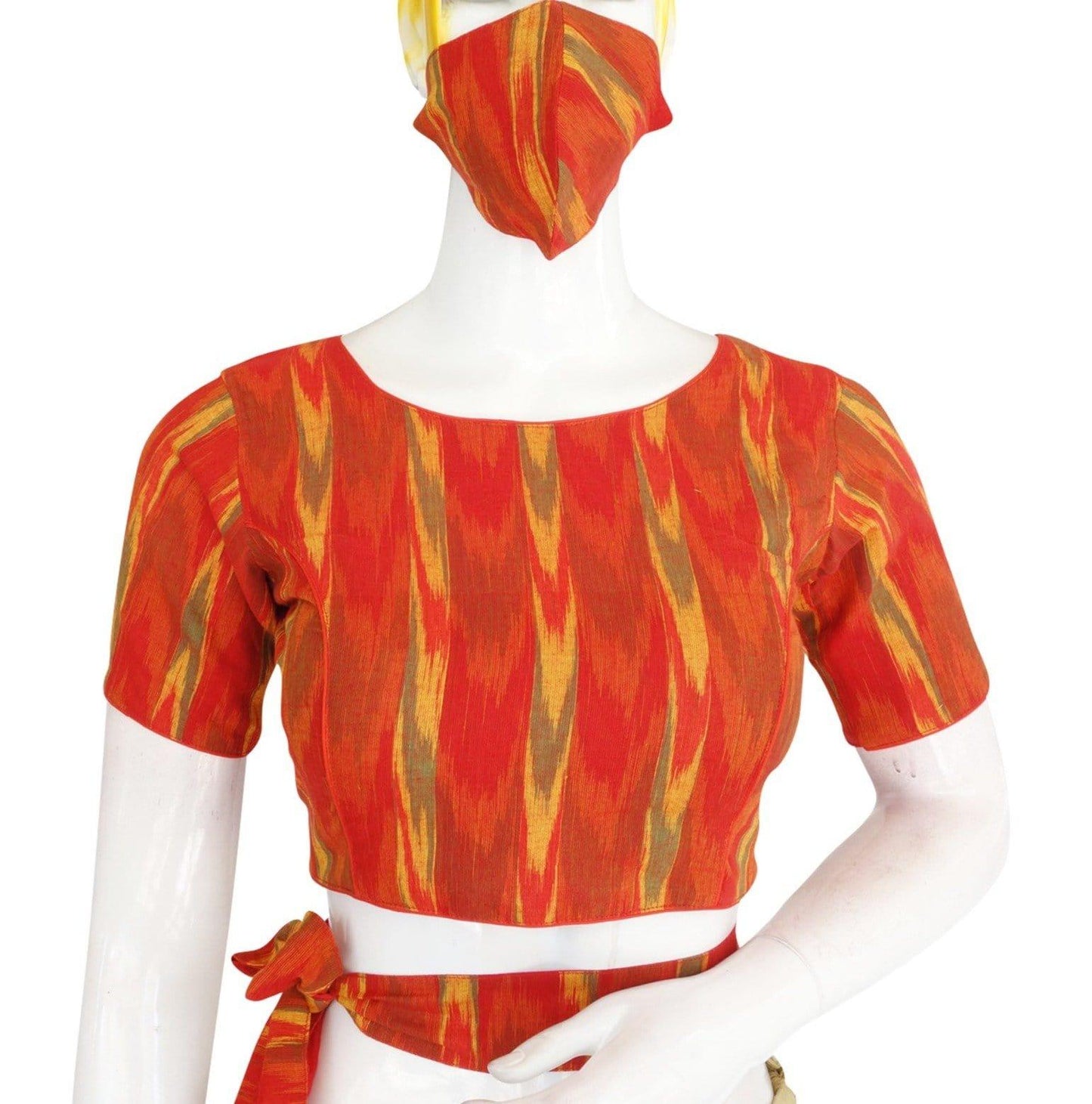 Elevate your saree game with our Ikkat Boat Neck Readymade Saree Blouse, complete with a belt and matching mask. Stay stylish and safe while making a fashion statement. Shop now and redefine your ethnic attire.