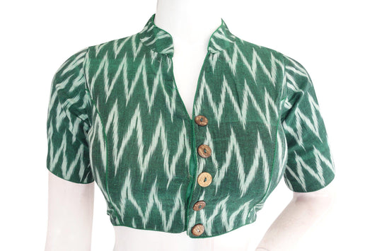 Make a fashion statement with our Green Ikkat Collar Readymade Blouse! Designed to elevate your look, this blouse exudes sophistication and style. Step up your fashion game with this trendy piece!