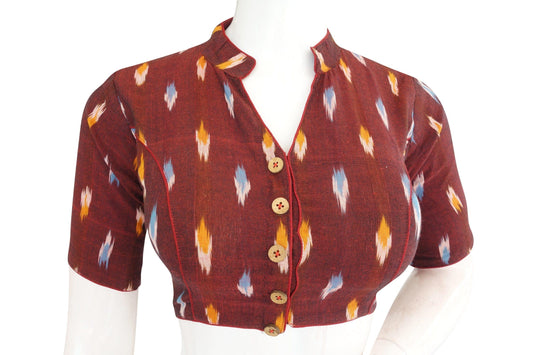 Indulge in classic elegance with our Elegant Maroon Ikkat Collar Designer Readymade Blouse. This piece epitomizes timeless sophistication, offering a perfect blend of tradition and modernity. Elevate your attire with its rich hue and intricate collar design, making it a must-have in every woman's wardrobe.